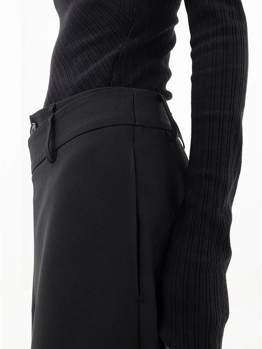 Comfortable women's grey baggy trousers with an asymmetric design & relaxed fit.