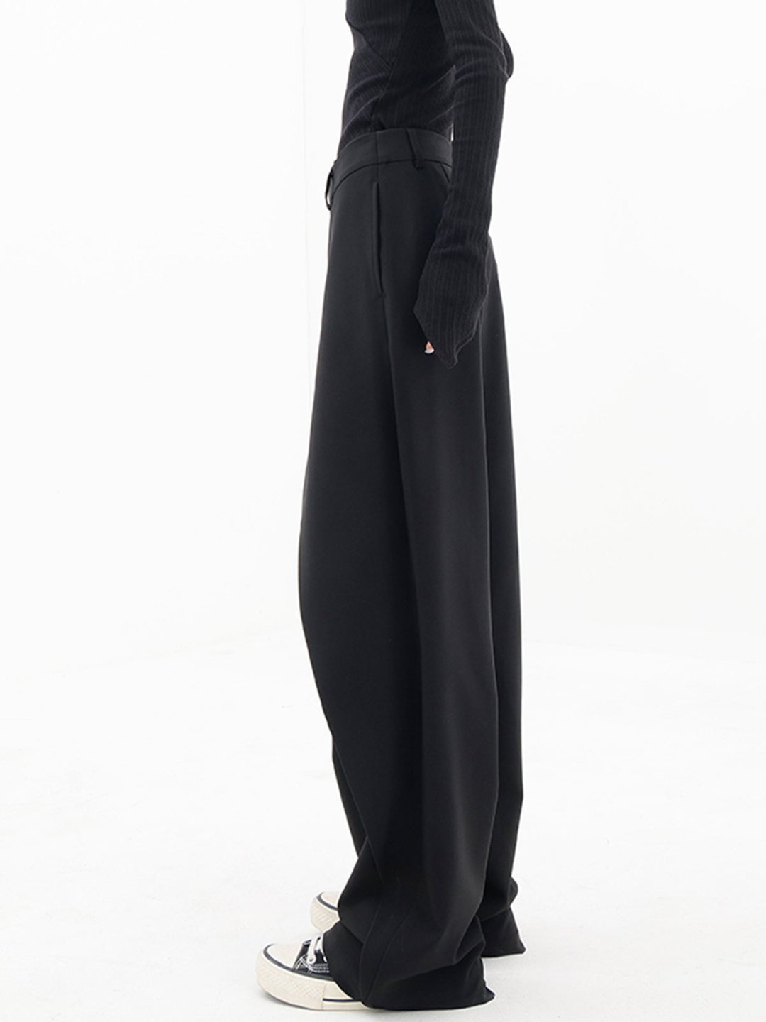 Fashionable women's asymmetric baggy trousers, offering comfort & a relaxed, chic style.