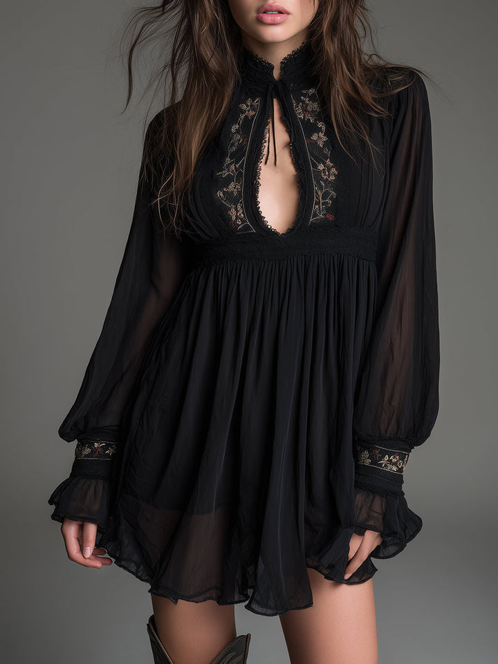 Women's black babydoll mini dress with keyhole neckline and stylish balloon sleeves, perfect for parties.