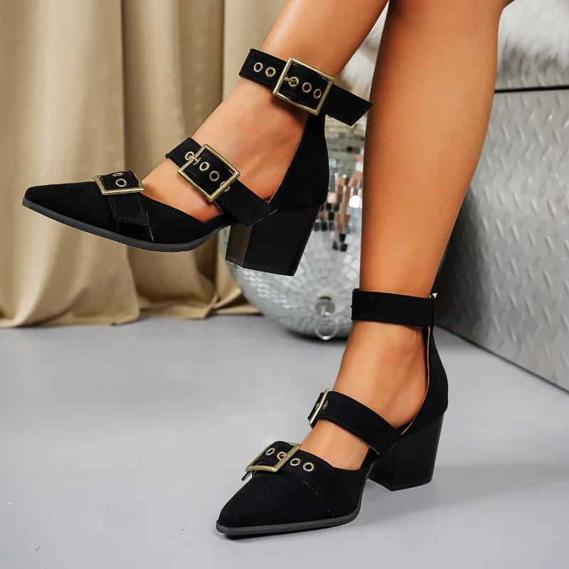 Close-up of a women's block heel shoe, highlighting the buckle and texture