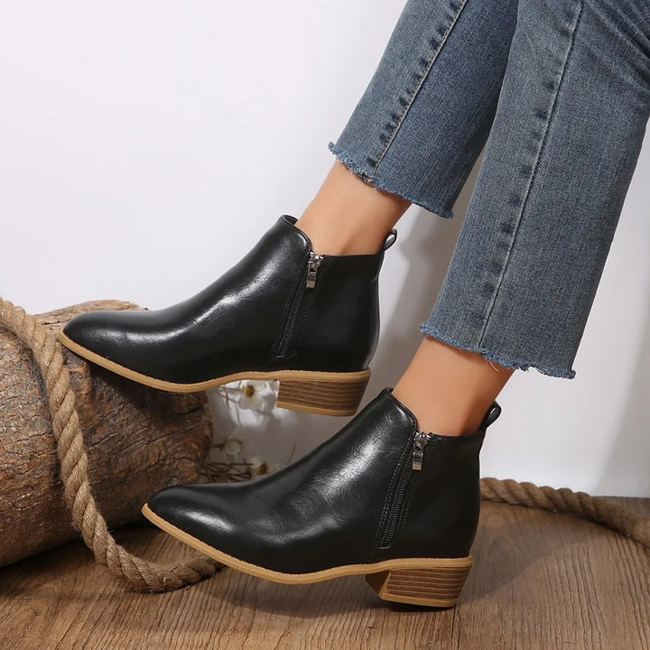 Women's black casual ankle boots with side zip closure for everyday style, comfortable spring-summer footwear