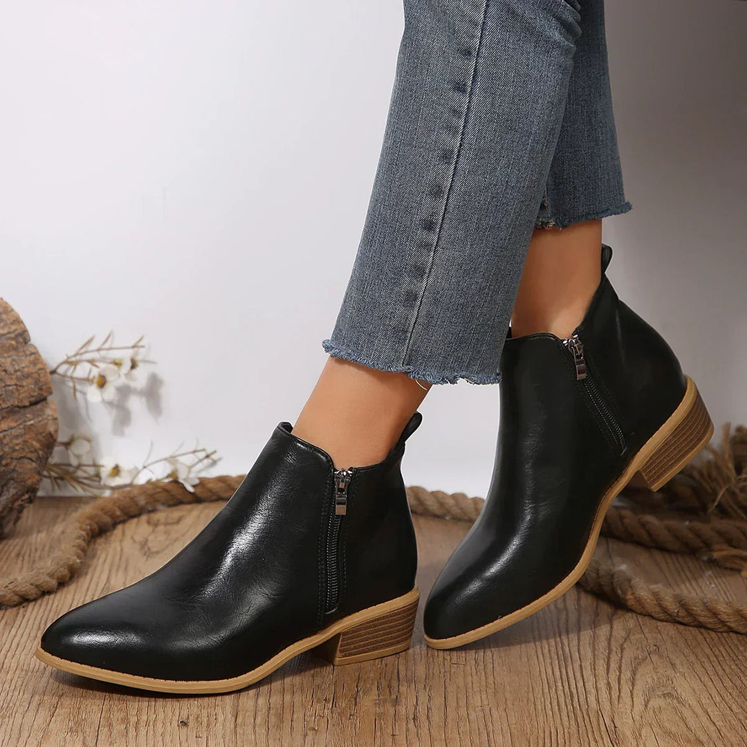 Stylish women's casual ankle boots featuring a practical side zip, ideal for spring-summer outfits