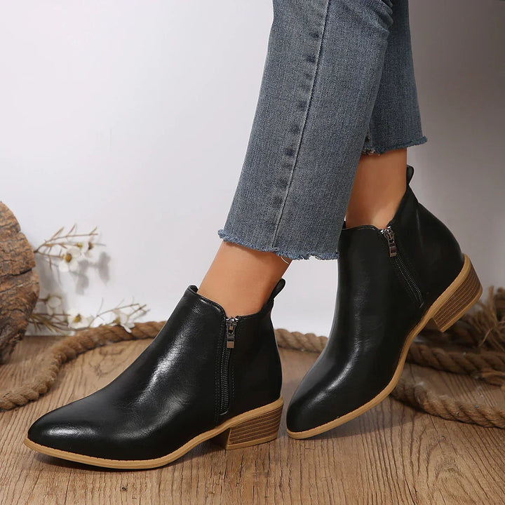 Stylish women's casual ankle boots featuring a practical side zip, ideal for spring-summer outfits