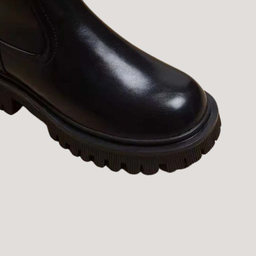 Everyday women's chunky mid-calf boots in black, suitable for spring and casual styling.