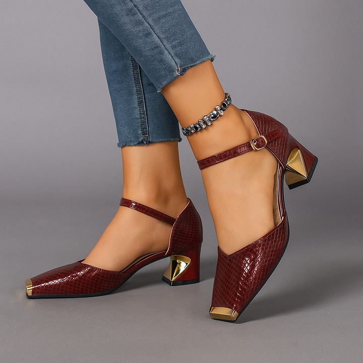 Stylish women's dress shoes, black croc-print block heels with a gleaming metal tip accent