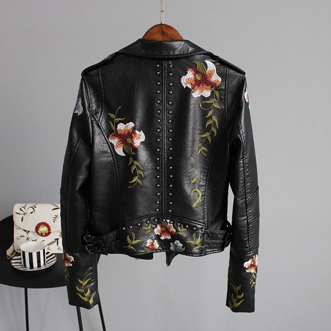 Fashionable women's floral embroidered faux leather biker jacket, perfect outerwear for a stylish look.