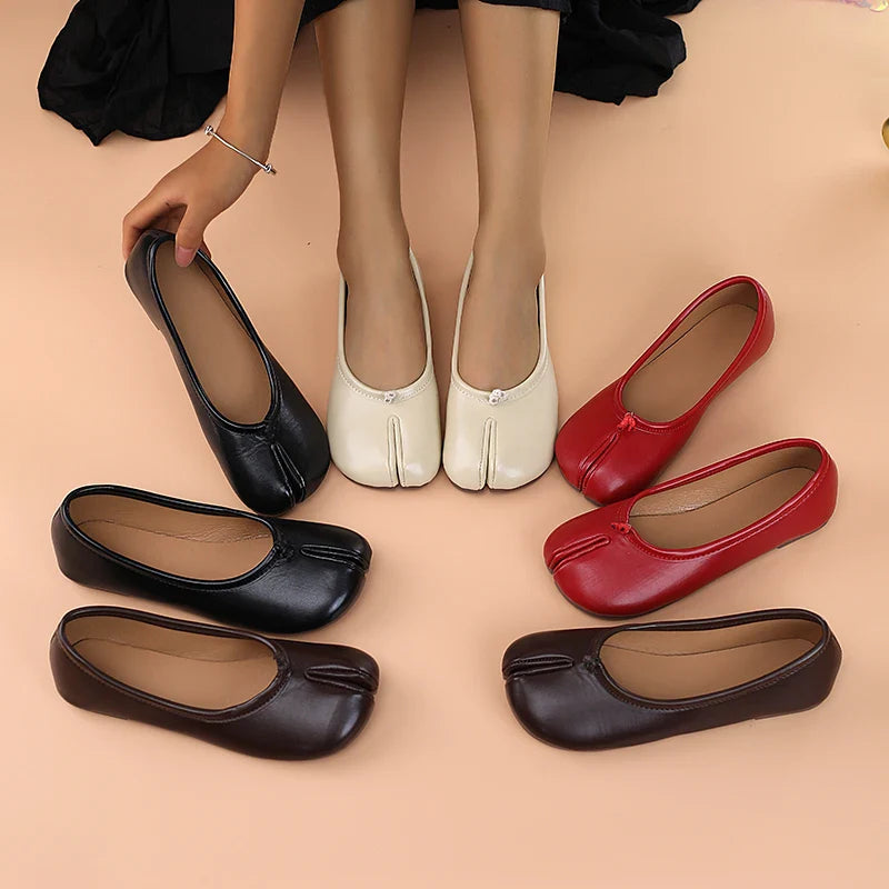 Women's black faux leather split toe slip-on flats, comfortable tabi style casual shoes.