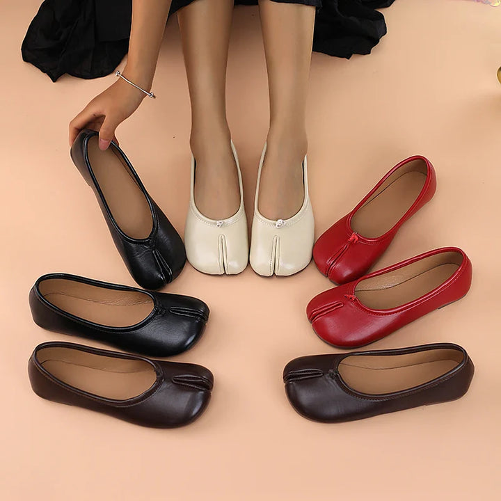 Women's black faux leather split toe slip-on flats, comfortable tabi style casual shoes.