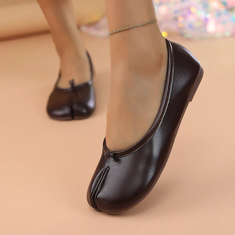 Women's casual slip-on split toe flats, designed for comfort and modern appeal.
