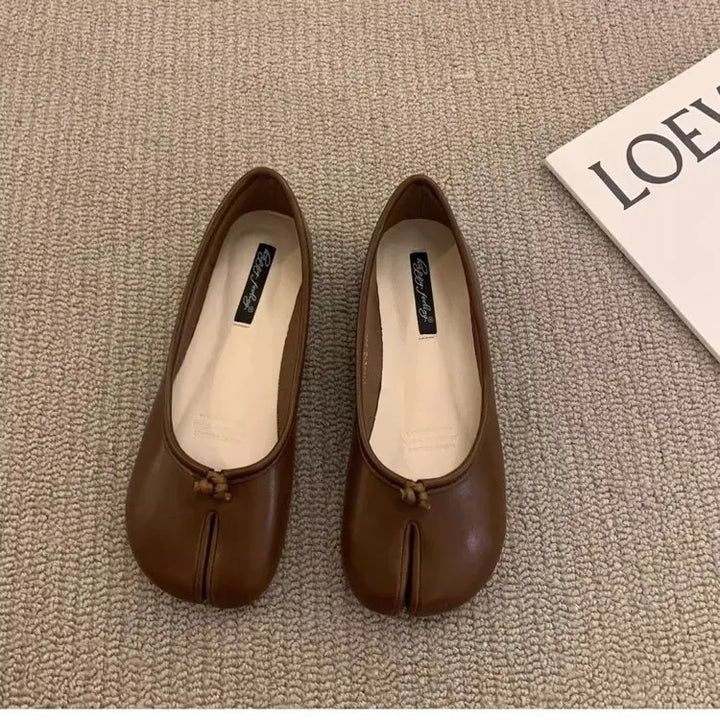 Modern women's tabi flats, offering a chic and easy-to-wear slip-on design.