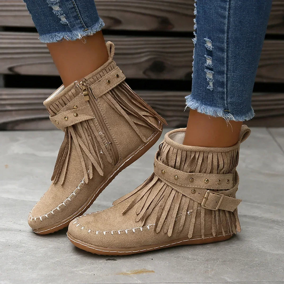 Women's elegant black fringe ankle boots, featuring a studded decorative buckle