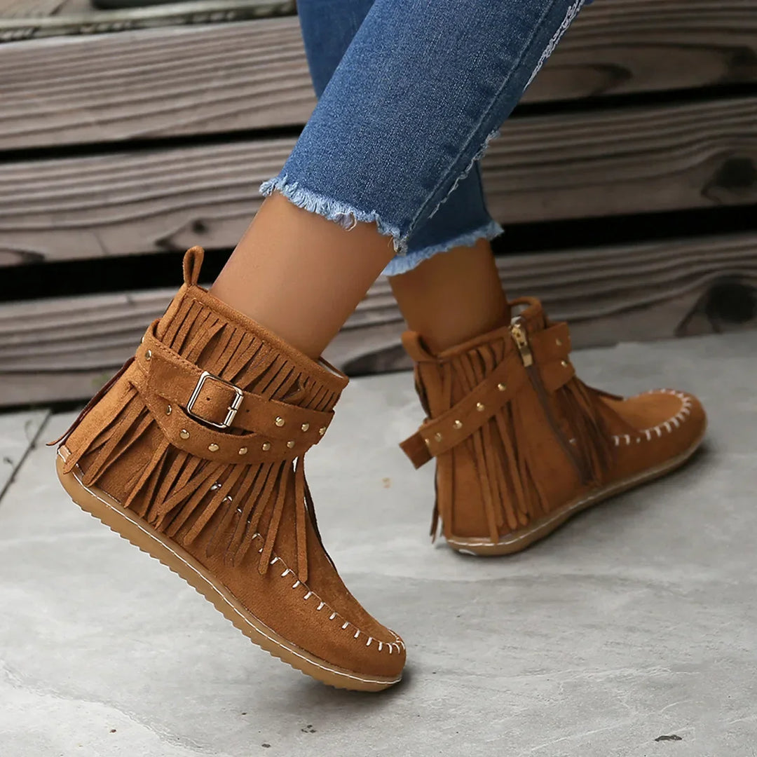 Comfortable women's black fringe ankle boots, designed with a trendy studded buckle