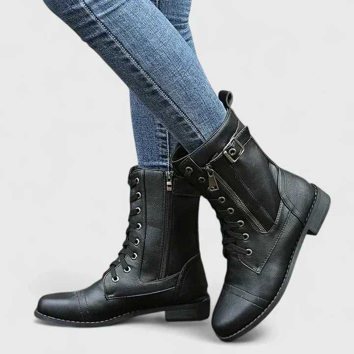 Fashionable women's ankle boots featuring lace-up front and convenient side-zip closure.