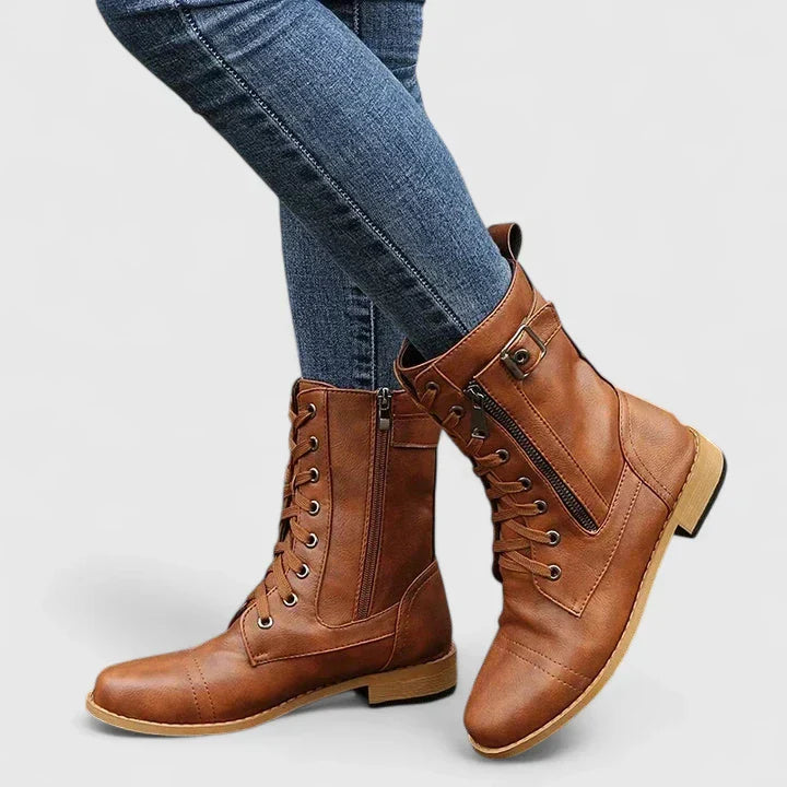 Chic women's footwear: lace-up ankle boots with side-zip, ideal for versatile styling.