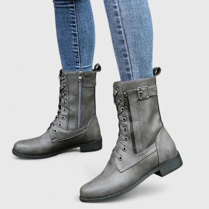 Casual women's boots with lace-up detail and practical side-zip, suitable for seasons.