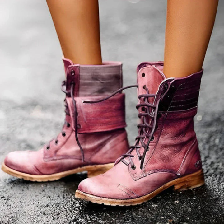 Women's black lace-up combat boots, rugged style for fall fashion, ankle height, side view