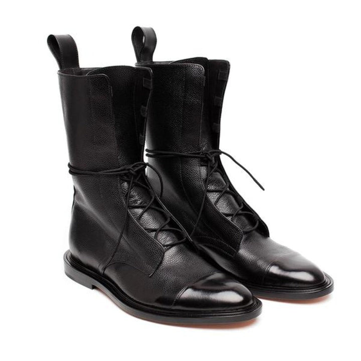 Women's black lace-up combat boots with durable sole, perfect for casual fashion.