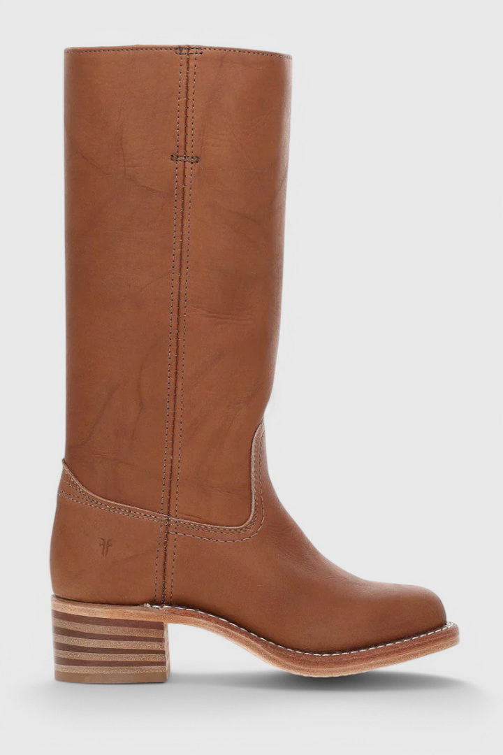 Women's knee-high leather boots with a polished finish, perfect for sophisticated style.