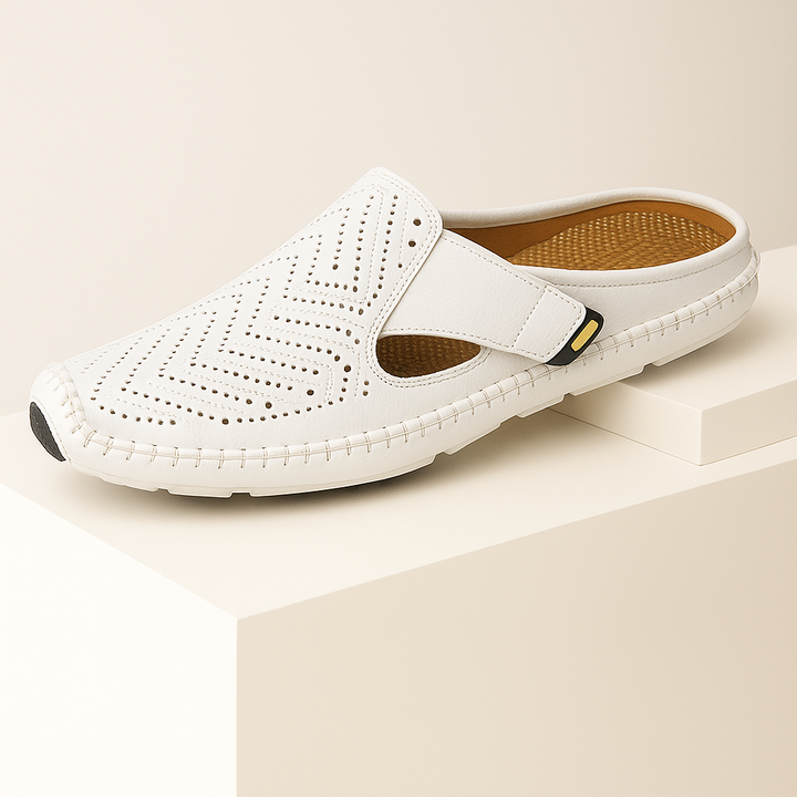 Comfortable black leather slip-on mules for women, ideal as fashion footwear for warmer seasons.