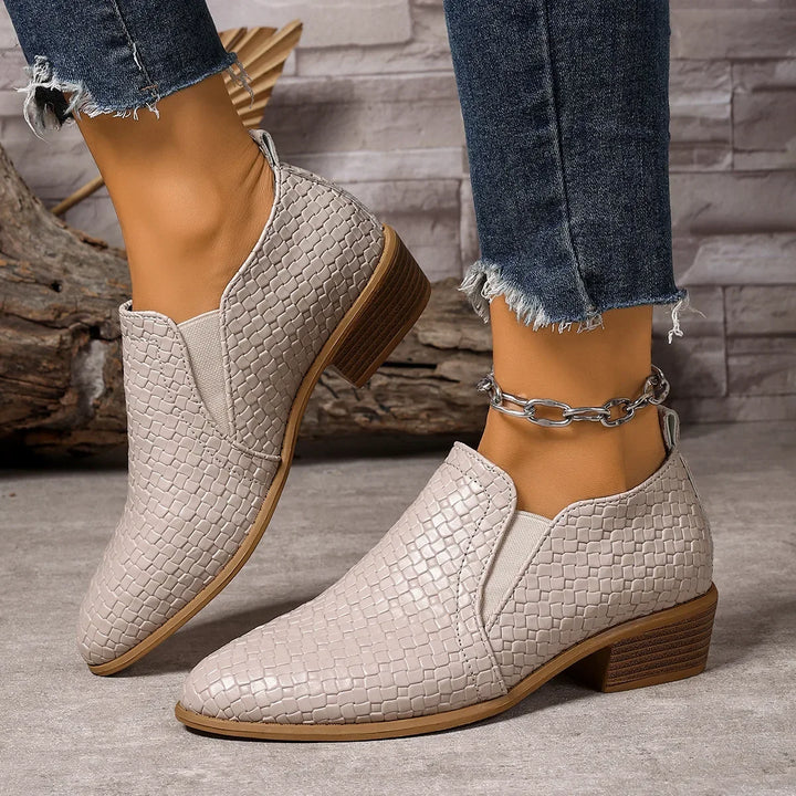 Front view of women's leather weave ankle boots, ideal for stylish and comfortable everyday wear.