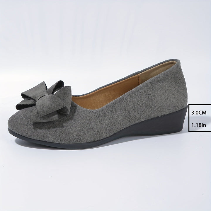 Gray orthopedic slip-on flats for women, arch support, elegant.