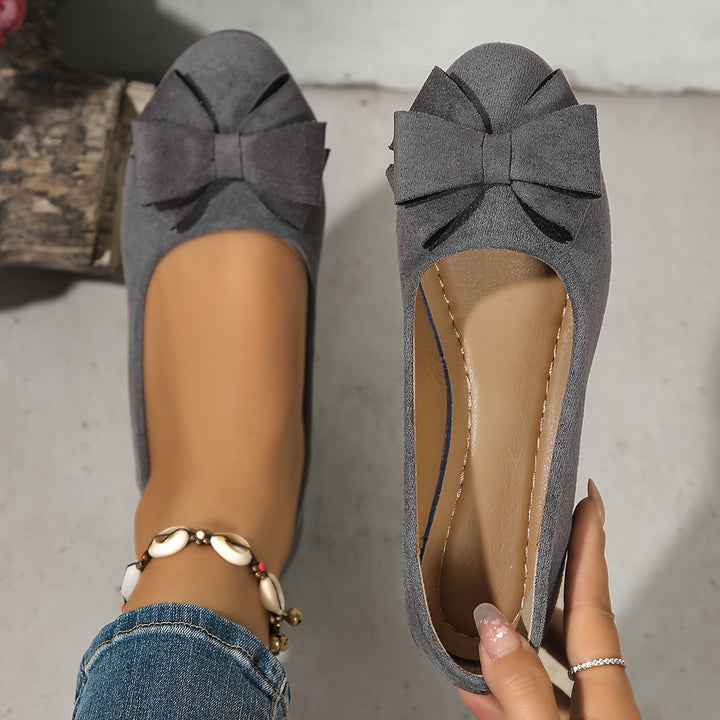 Blue elegant orthopedic flats for women, low heel, daily comfort.