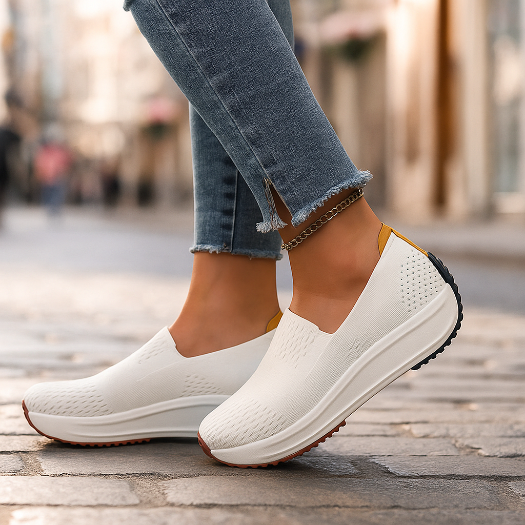 Women's black orthopedic slip-on walking shoes with knit upper, front view, comfortable & lightweight