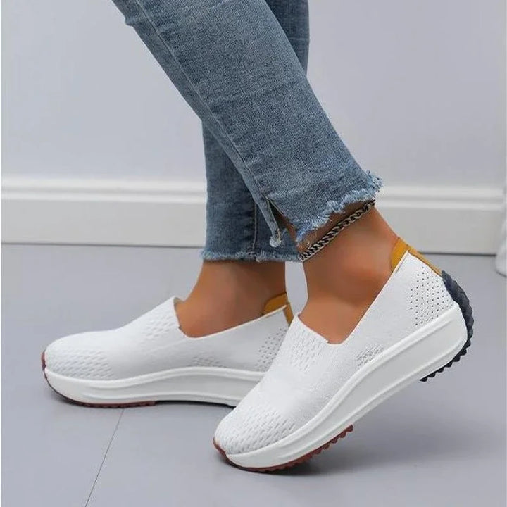 Close-up of the breathable knit upper on women's orthopedic slip-on walking shoes, flexible design