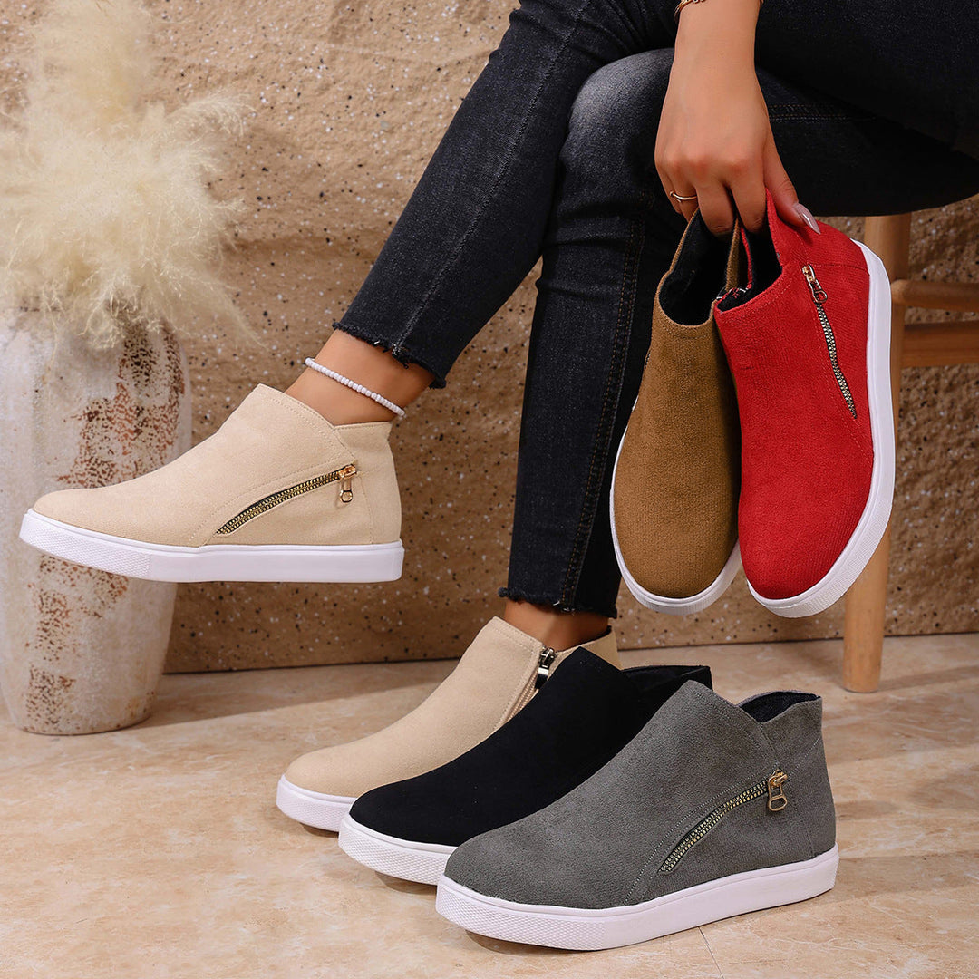 Side view of grey women's zip-up comfort sneakers, designed for shock absorbing walking support.