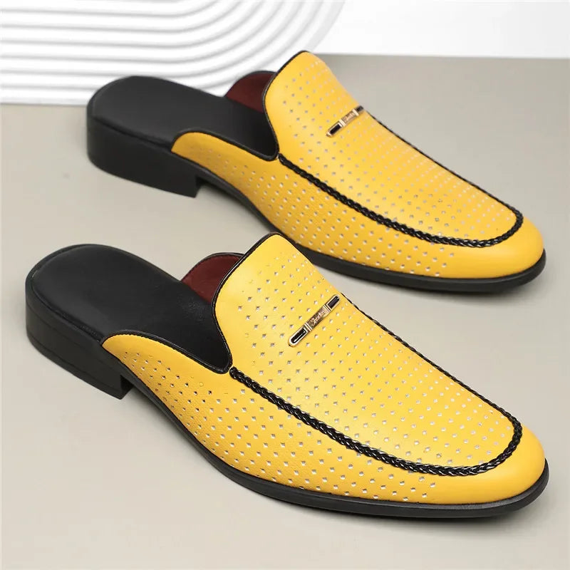 Women's elegant mules crafted from breathable perforated leather, ideal for casual wear