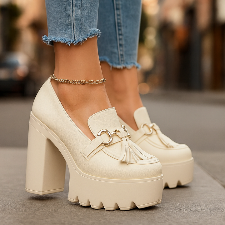 Close-up of a women's platform loafer featuring a stylish tassel detail and orthopedic insole.
