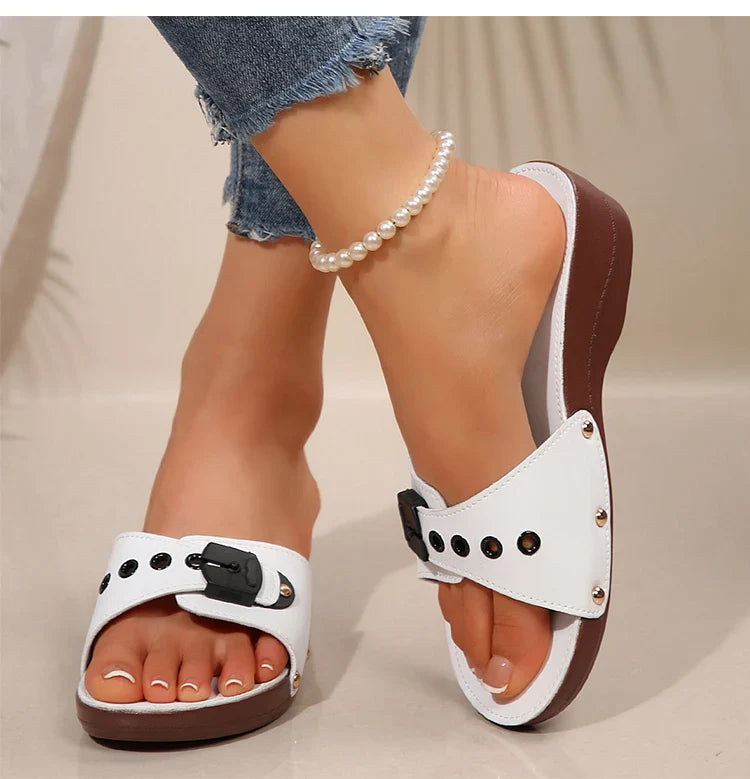 Fashionable women's platform wedge slide sandals in black, ideal for summer outfits
