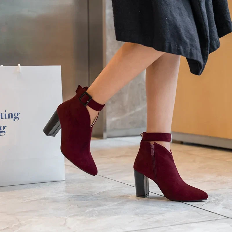 Women's versatile black ankle boots, pointed toe, subtle buckles, perfect for fashion