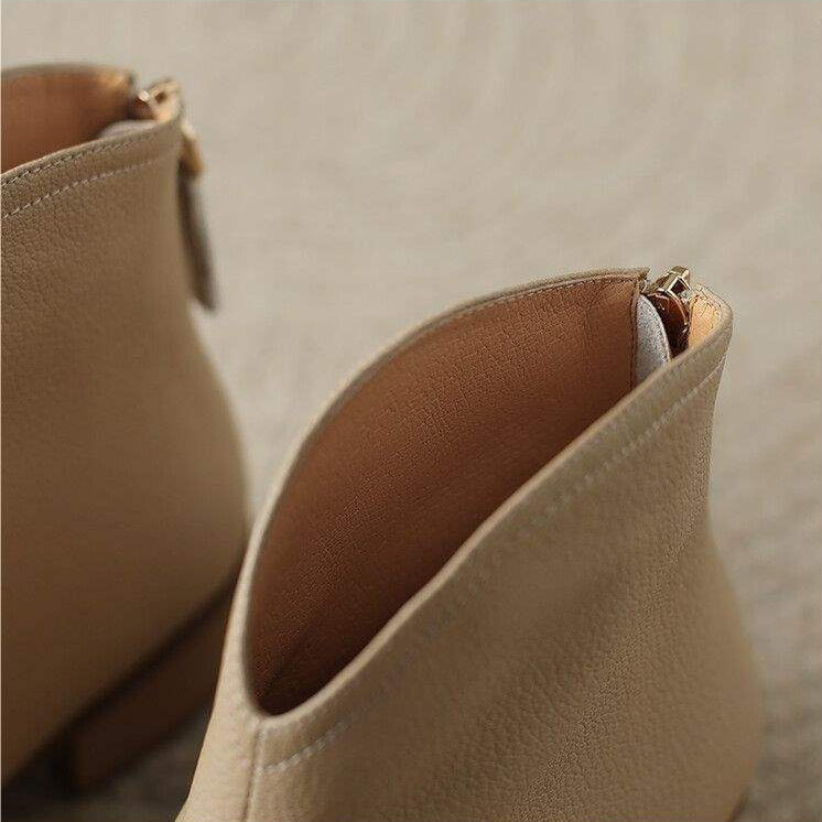 Smooth faux leather women's pointed toe ankle boots, low heel, slip-on.