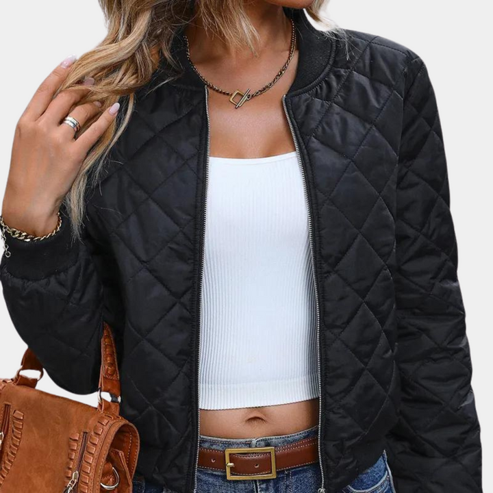 Black zip-up quilted bomber jacket for women, ideal casual outerwear with modern design