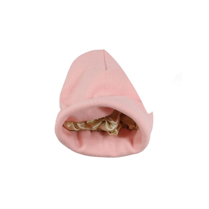 Close-up of the satin interior of a women's winter beanie, hair protection feature