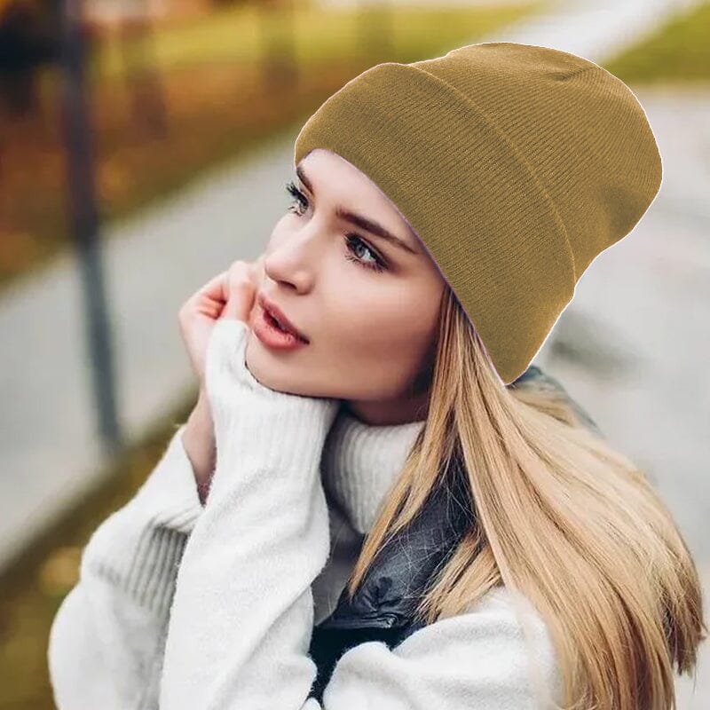 Folded women's winter beanie, revealing the smooth satin lining for hair care