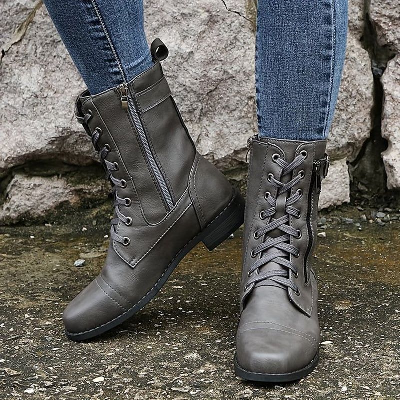 Fashion-forward women's combat boots, showcasing the popular side-zip trend