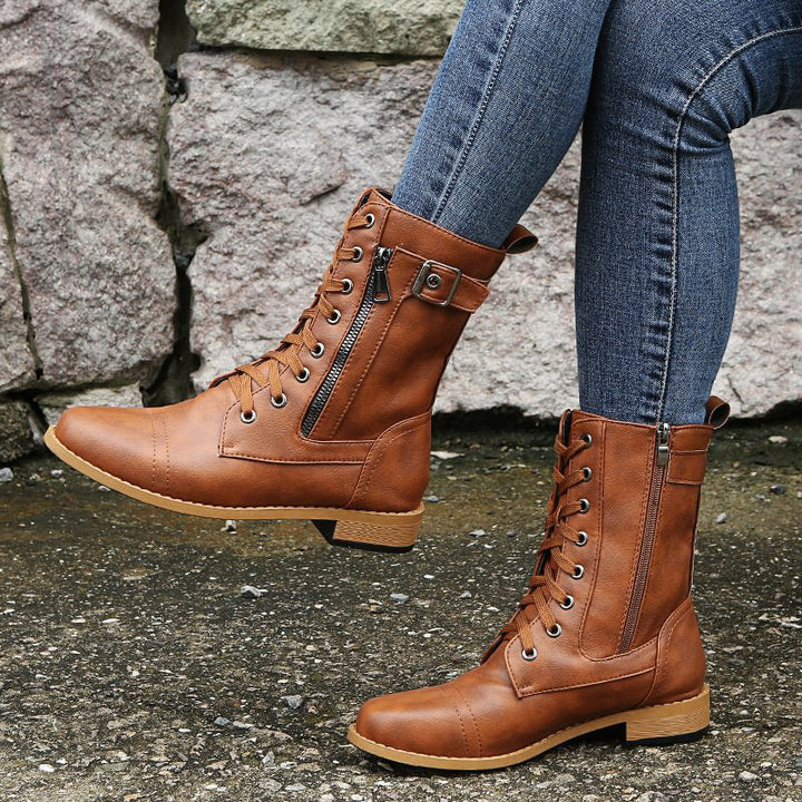 Stylish black women's combat boots with side zipper, versatile and durable