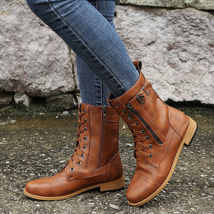 Durable women's combat boots, designed for comfort with a side zipper