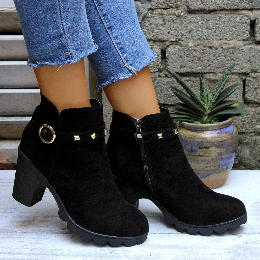 Women's fall fashion studded block heel boots, offering a blend of style and durability