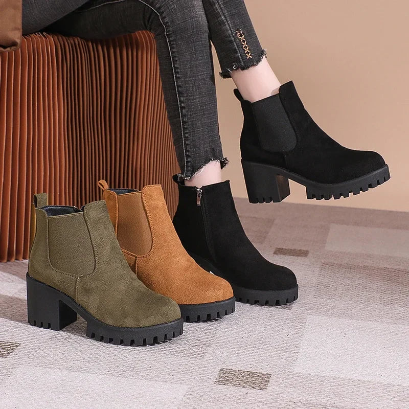 Classic black suede ankle boots for women, designed with a comfortable block heel for all-day wear