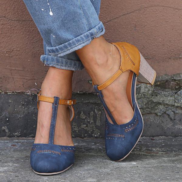 Chic women's T-strap block heel footwear with an ankle buckle, great for sophisticated formal events.