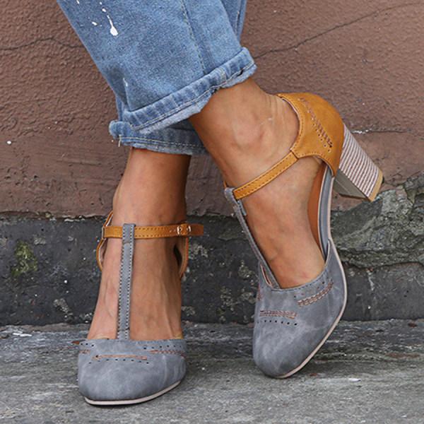Versatile women's T-strap block heel shoes with an ankle buckle, ideal for a refined everyday look.