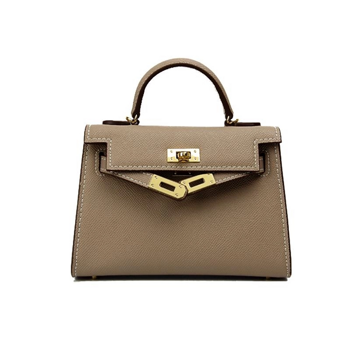 Women's structured top handle crossbody bag. Smooth finish, adjustable strap, turn lock. Ideal black, beige, brown handbag.