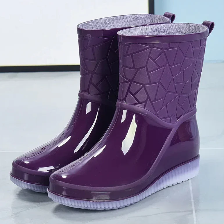 Stylish women's casual winter rain boots in a neutral color, suitable for outdoor wear