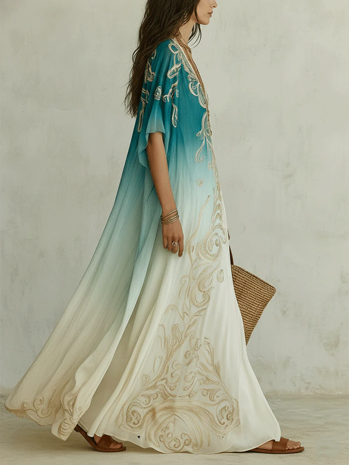 Flowing blue ombre kaftan maxi dress for women, featuring a V-neck and boho-chic style. Ideal casual summer wear.