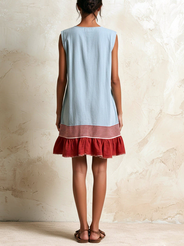 Women's blue tiered ruffle mini dress featuring a sleeveless design and chic contrast hem.
