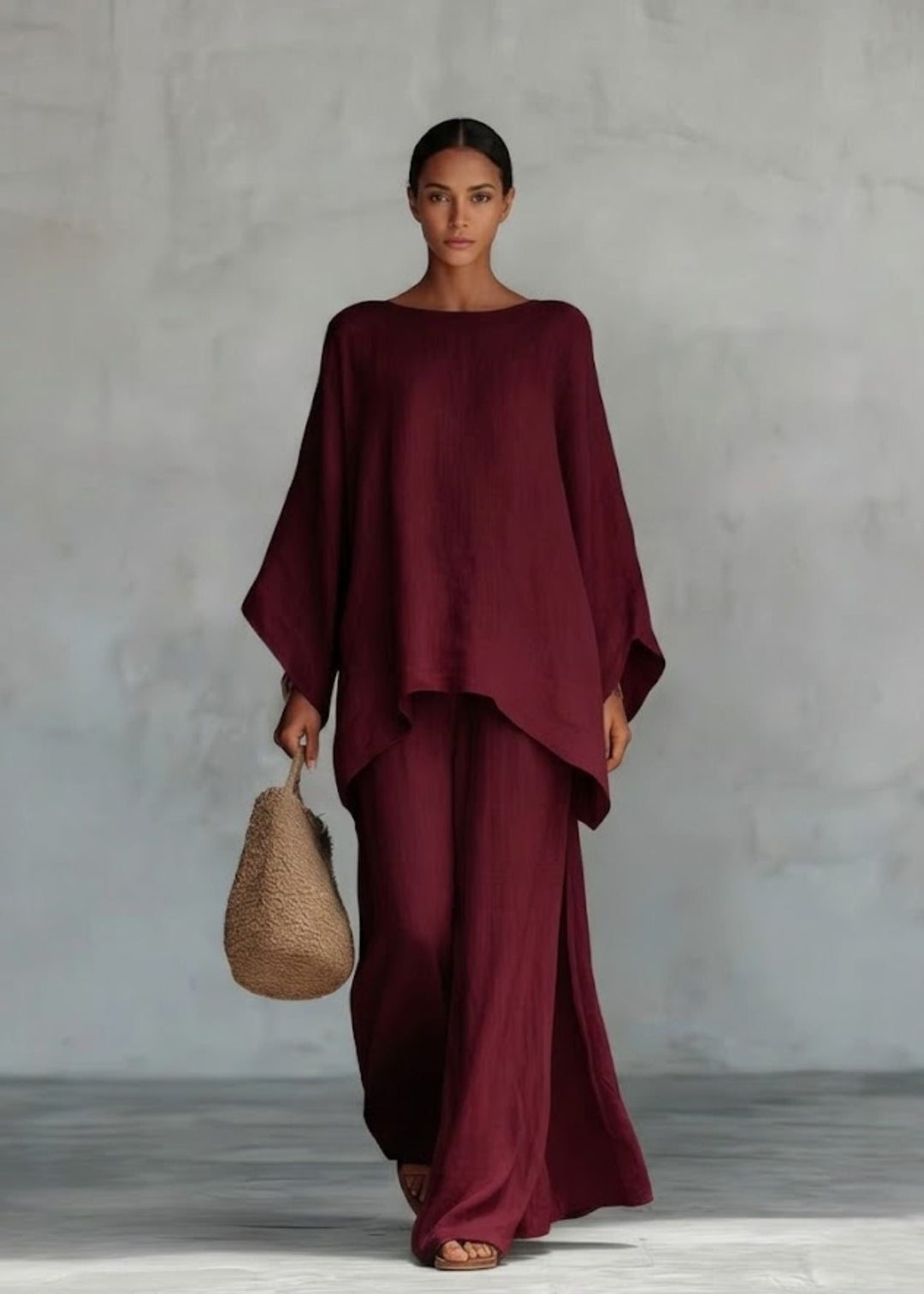 Women's stylish two-piece set: bohemian cape top & flowy wide-leg pants, great for summer resort fashion.