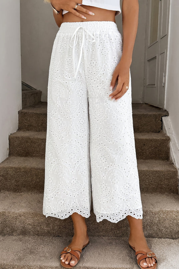 Women's bohemian cropped pants, perfect for summer vacations & beach outfits. Relaxed fit, stylish casual bottoms.